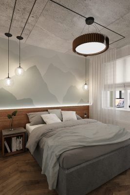 кровать с рисунком в виде гор на стене у изголовья